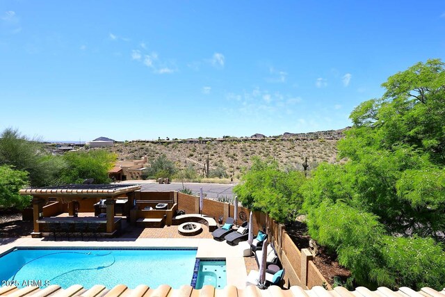 11215 N Garland Cir, Fountain Hills, AZ 85268 - view of pool featuring a pool with connected hot tub and a patio area