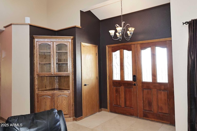 11215 N Garland Cir, Fountain Hills, AZ 85268 - entryway featuring light tile patterned flooring and a chandelier