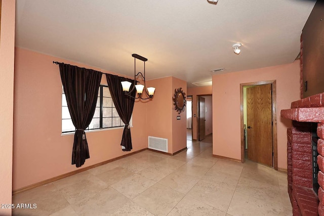 11215 N Garland Cir, Fountain Hills, AZ 85268 - spare room with baseboards, a notable chandelier, and visible vents