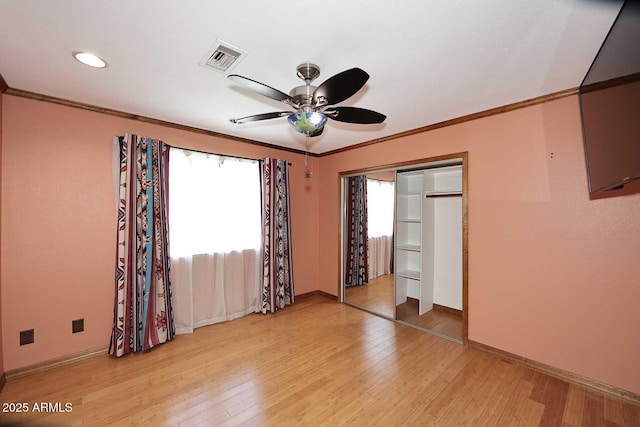 11215 N Garland Cir, Fountain Hills, AZ 85268 - empty room with ceiling fan, visible vents, crown molding, light wood-type flooring, and baseboards