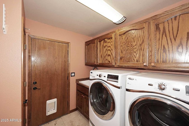 11215 N Garland Cir, Fountain Hills, AZ 85268 - laundry room featuring light tile patterned floors, cabinet space, and washer and clothes dryer