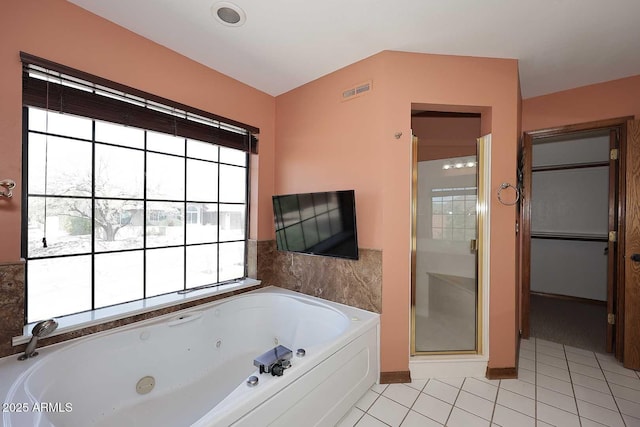 11215 N Garland Cir, Fountain Hills, AZ 85268 - bathroom with visible vents, a stall shower, a tub with jets, tile patterned floors, and baseboards