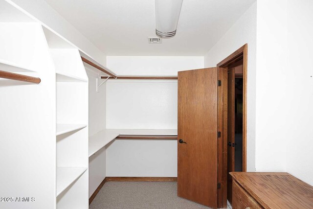 11215 N Garland Cir, Fountain Hills, AZ 85268 - spacious closet featuring carpet flooring and visible vents
