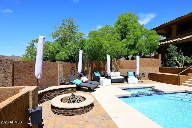 11215 N Garland Cir, Fountain Hills, AZ 85268 - view of swimming pool featuring a pool with connected hot tub, fence, a fire pit, and a patio area