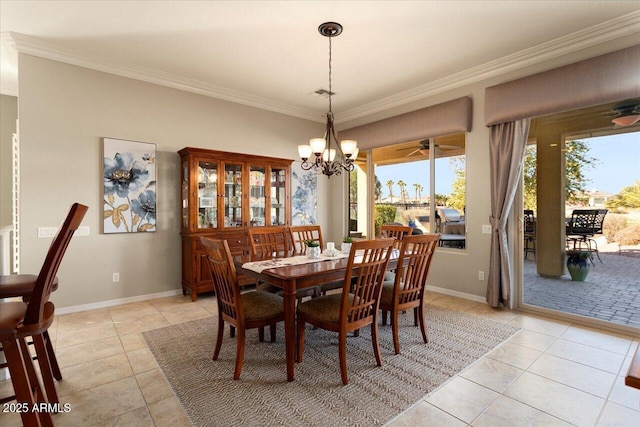 tiled dining space with crown molding and a chandelier