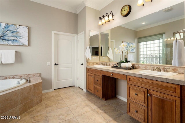 bathroom featuring tile patterned flooring, vanity, ornamental molding, and tiled bath