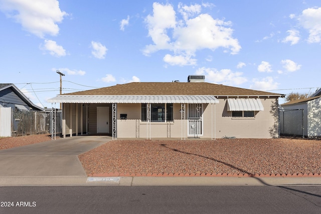 view of front of house featuring a carport