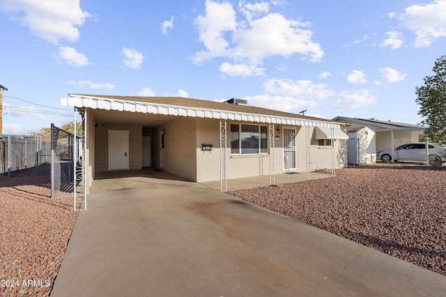 view of front of house with a carport