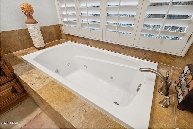 bathroom featuring a whirlpool tub