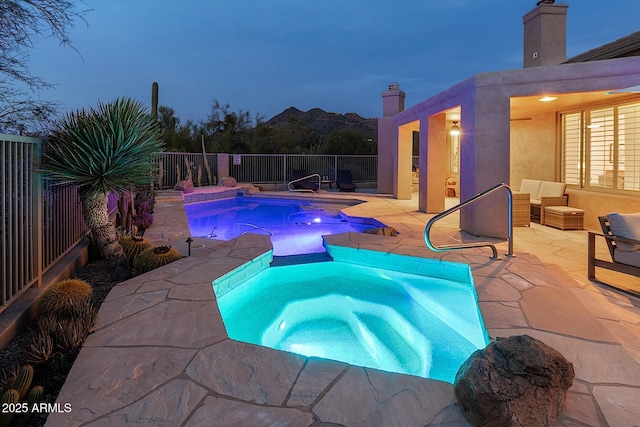 view of swimming pool with fence, a fenced in pool, and a patio