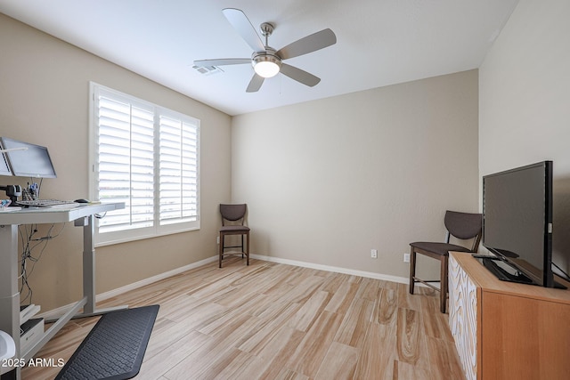 office area featuring ceiling fan and light hardwood / wood-style floors