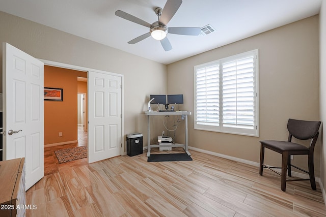 interior space featuring light wood-type flooring and ceiling fan