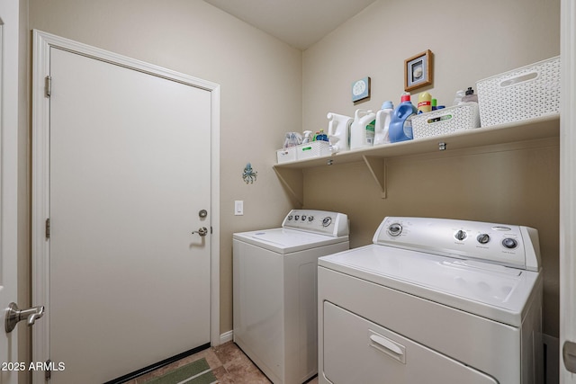 laundry area featuring washer and clothes dryer