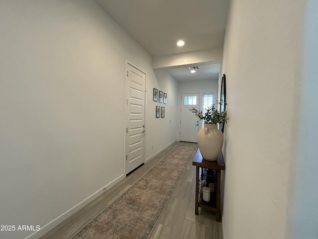 hall featuring hardwood / wood-style flooring