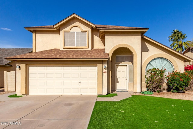 view of front facade featuring a garage and a front yard