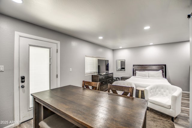 bedroom featuring hardwood / wood-style flooring