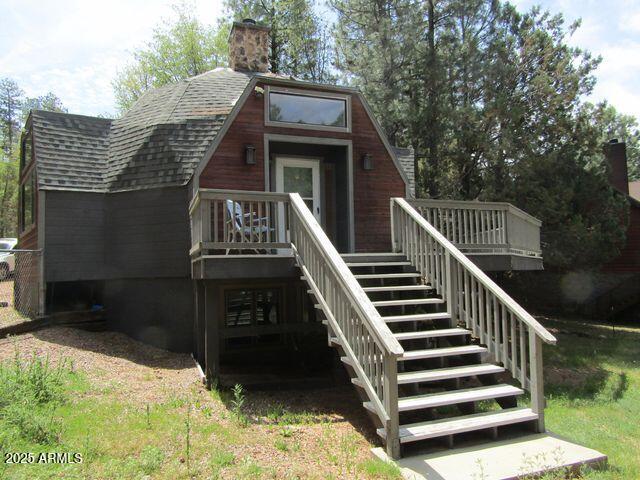 474 N Meadow Way, Payson, AZ 85541 - back of house with stairs, a shingled roof, a deck, and a chimney