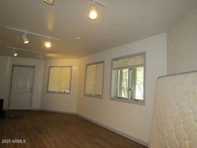 474 N Meadow Way, Payson, AZ 85541 - empty room featuring crown molding, wood finished floors, and track lighting