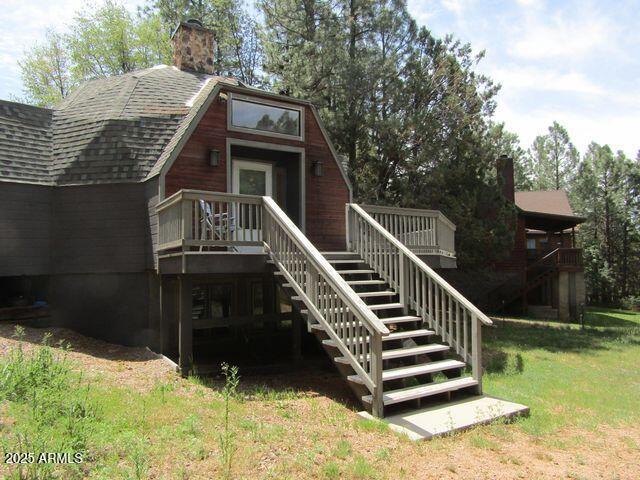 474 N Meadow Way, Payson, AZ 85541 - back of house featuring stairway, a shingled roof, a deck, and a yard