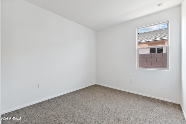 empty room featuring carpet flooring