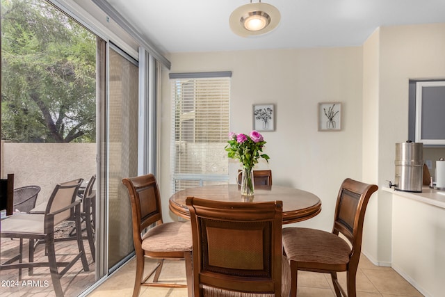 view of tiled dining space