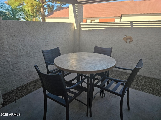 view of patio with outdoor dining space