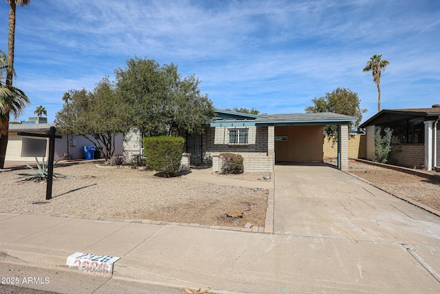 view of front of property with a carport