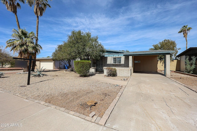 view of front of home with a carport