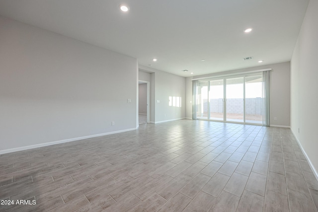 empty room with light wood-type flooring