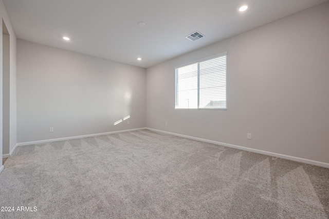 spare room with carpet flooring