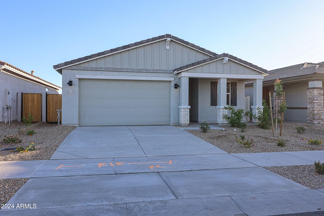 view of front of property with a garage