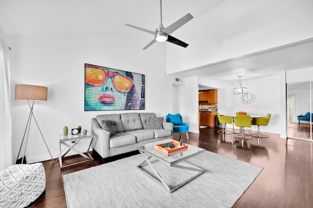 7350 N Via Paseo Del Sur Unit O202, Scottsdale, AZ 85258 - living area with baseboards, ceiling fan with notable chandelier, dark wood finished floors, and visible vents
