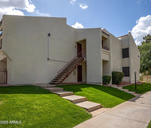7350 N Via Paseo Del Sur Unit O202, Scottsdale, AZ 85258 - view of building exterior with stairway