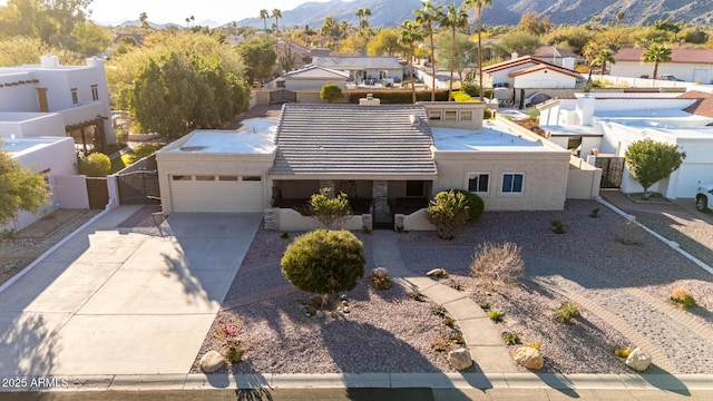 aerial view featuring a residential view and a mountain view