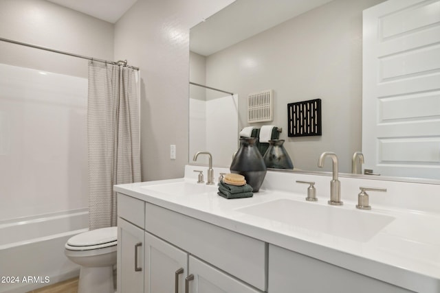 full bathroom featuring vanity, toilet, shower / bathtub combination with curtain, and wood-type flooring