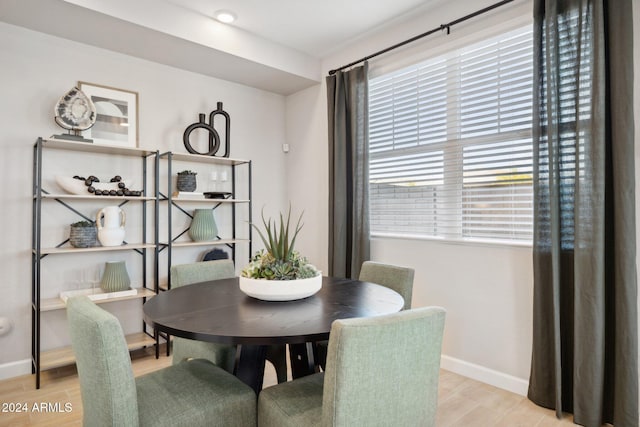 dining space featuring light hardwood / wood-style floors