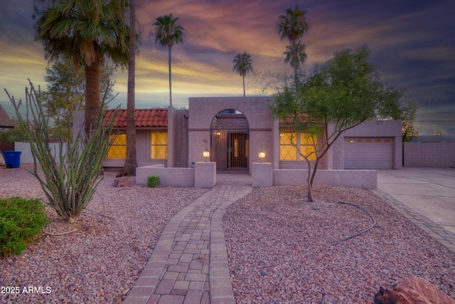 3204 N Jay St, Chandler, AZ 85225 - mediterranean / spanish house with concrete driveway, stucco siding, and a tile roof