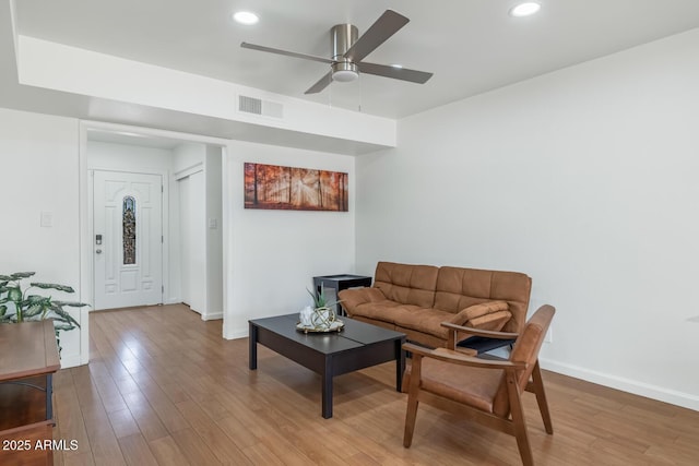 3204 N Jay St, Chandler, AZ 85225 - living area featuring light wood-style floors, a ceiling fan, and recessed lighting