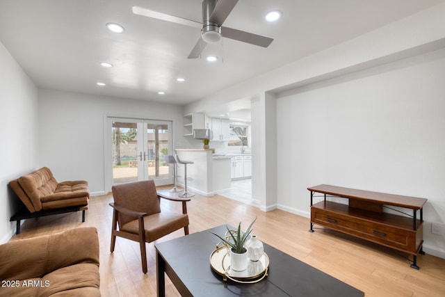 3204 N Jay St, Chandler, AZ 85225 - living room with french doors, recessed lighting, light wood-style flooring, and a ceiling fan