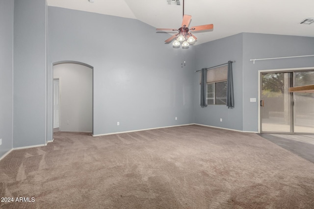 unfurnished room featuring lofted ceiling, ceiling fan, and carpet floors