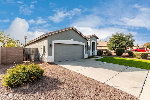 single story home featuring a garage