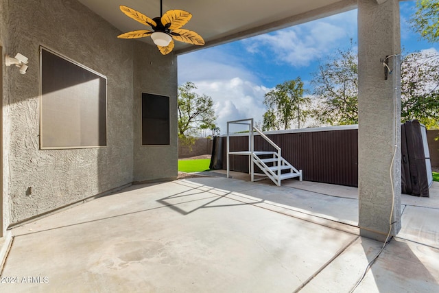 view of patio featuring ceiling fan