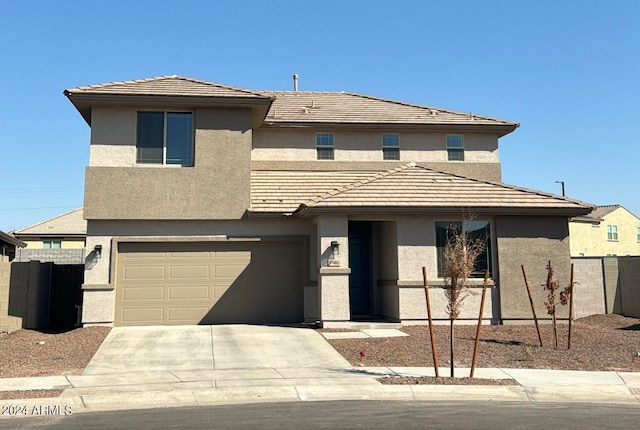 view of front of home with a garage