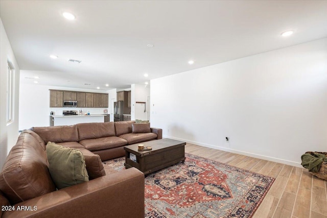 living room featuring light hardwood / wood-style floors