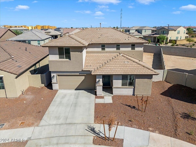 front of property featuring a garage