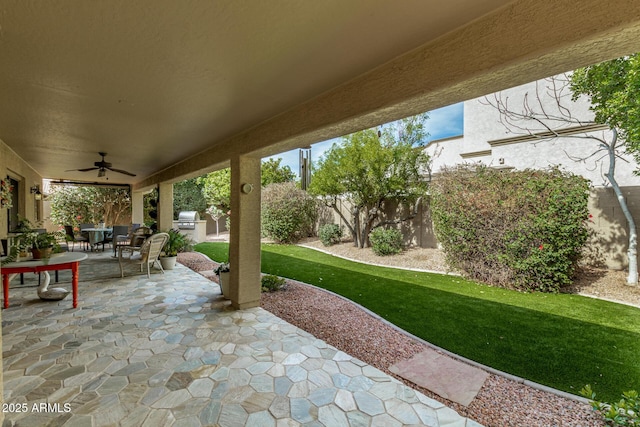 view of patio featuring outdoor dining space, a fenced backyard, a ceiling fan, and a grill