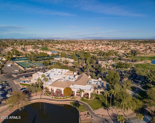 birds eye view of property with a water view and a residential view