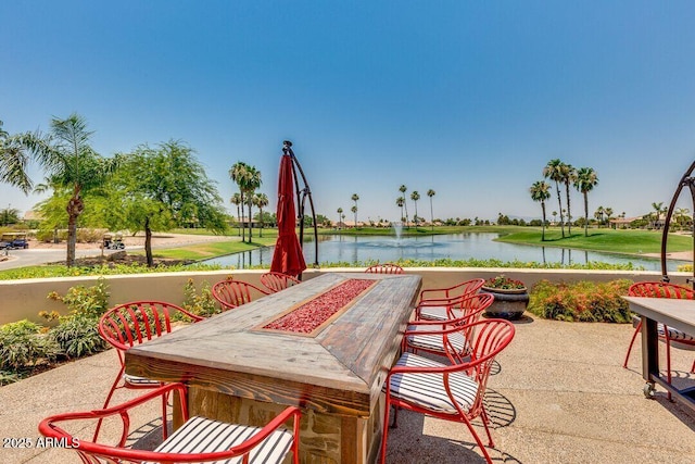 view of patio / terrace with a water view