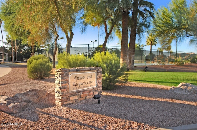 view of property's community with fence