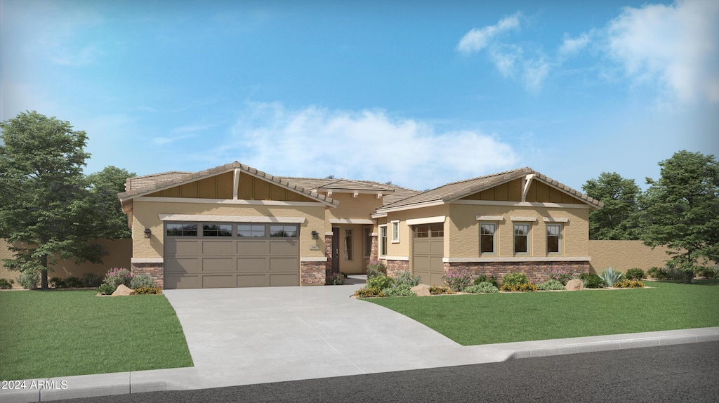 craftsman-style home featuring a garage and a front lawn